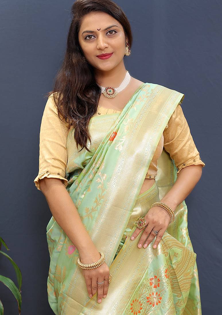 Mint green banarasi silk blend saree with all-over gold zari floral jaal