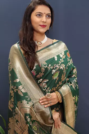Dark green banarasi silk blend saree with all-over gold zari floral jaal