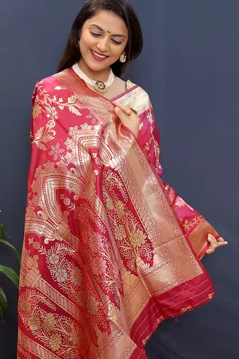 Rani pink banarasi silk blend saree with all-over gold zari floral jaal