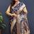 Navy blue banarasi silk blend saree with all-over gold zari floral jaal