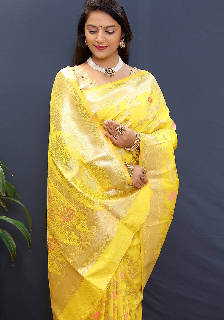 Yellow banarasi silk blend saree with all-over gold zari floral jaal