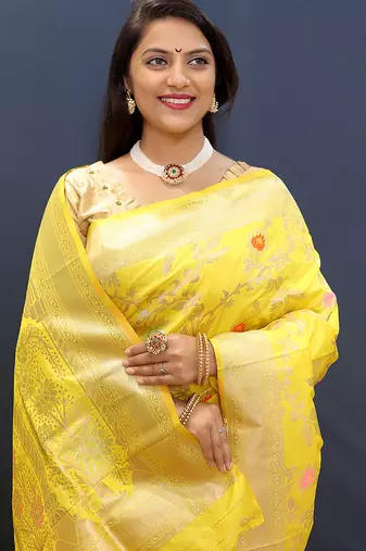 Yellow banarasi silk blend saree with all-over gold zari floral jaal