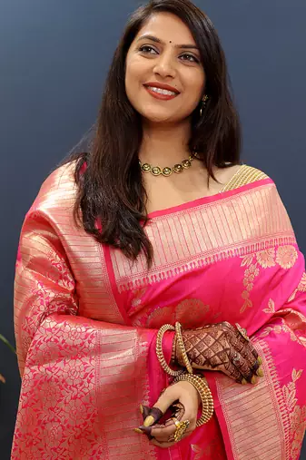 Rani pink banarasi silk blend saree with gold zari floral weaving & rich border