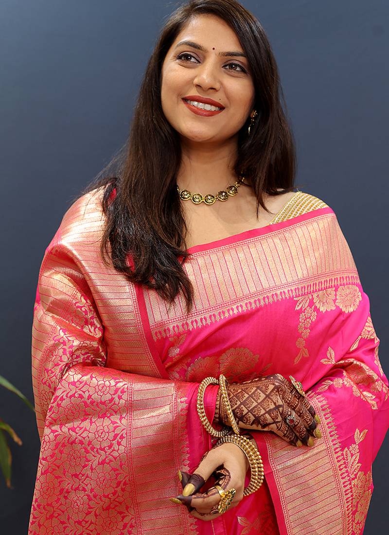 Rani pink banarasi silk blend saree with gold zari floral weaving & rich border