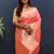 Light pink banarasi silk blend saree with gold zari floral weaving & rich border
