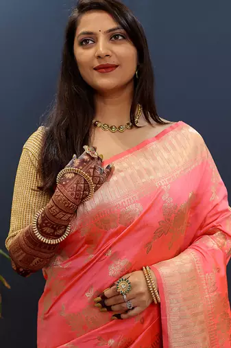 Light pink banarasi silk blend saree with gold zari floral weaving & rich border