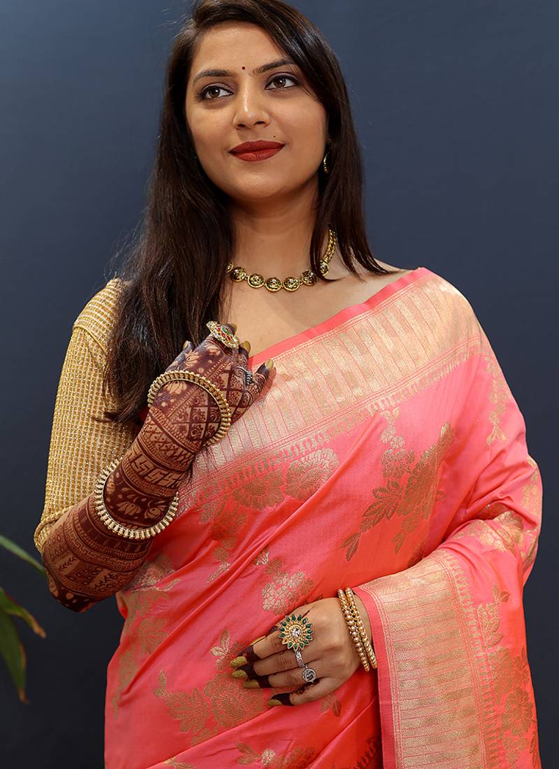 Light pink banarasi silk blend saree with gold zari floral weaving & rich border