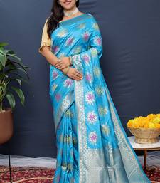Sky blue banarasi silk blend saree with  zari floral buta work