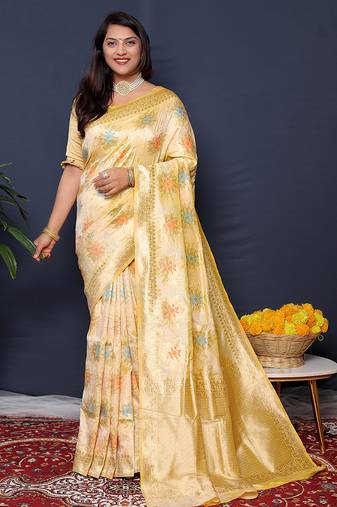 Cream banarasi silk blend saree with  zari floral buta work