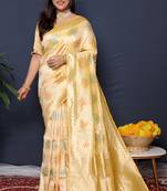 Cream banarasi silk blend saree with  zari floral buta work