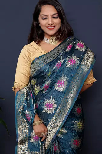 Teal blue banarasi silk blend saree with  zari floral buta work