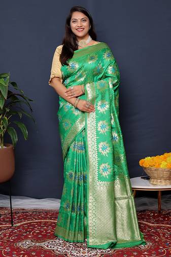 Sea green banarasi silk blend saree with  zari floral buta work