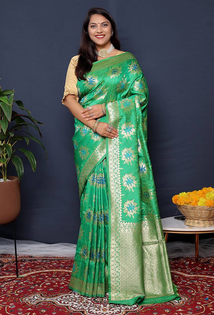 Sea green banarasi silk blend saree with  zari floral buta work