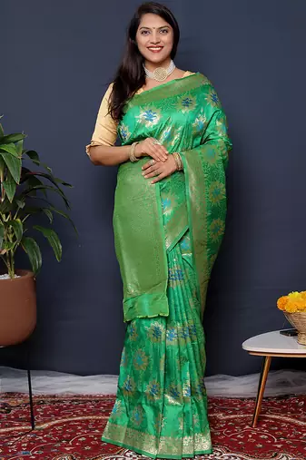 Sea green banarasi silk blend saree with  zari floral buta work
