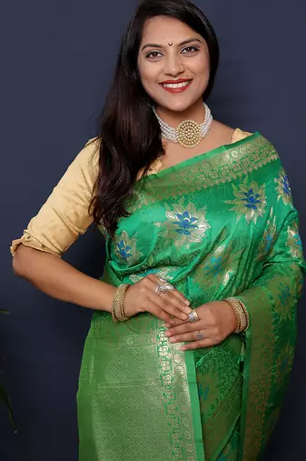 Sea green banarasi silk blend saree with  zari floral buta work