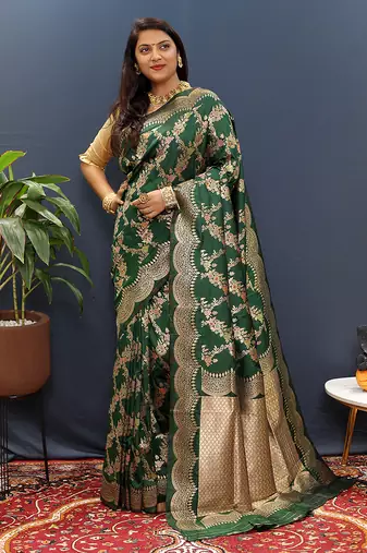 Dark green banarasi silk blend saree with gold zari floral weaving & rich pallu