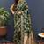 Dark green banarasi silk blend saree with gold zari floral weaving & rich pallu
