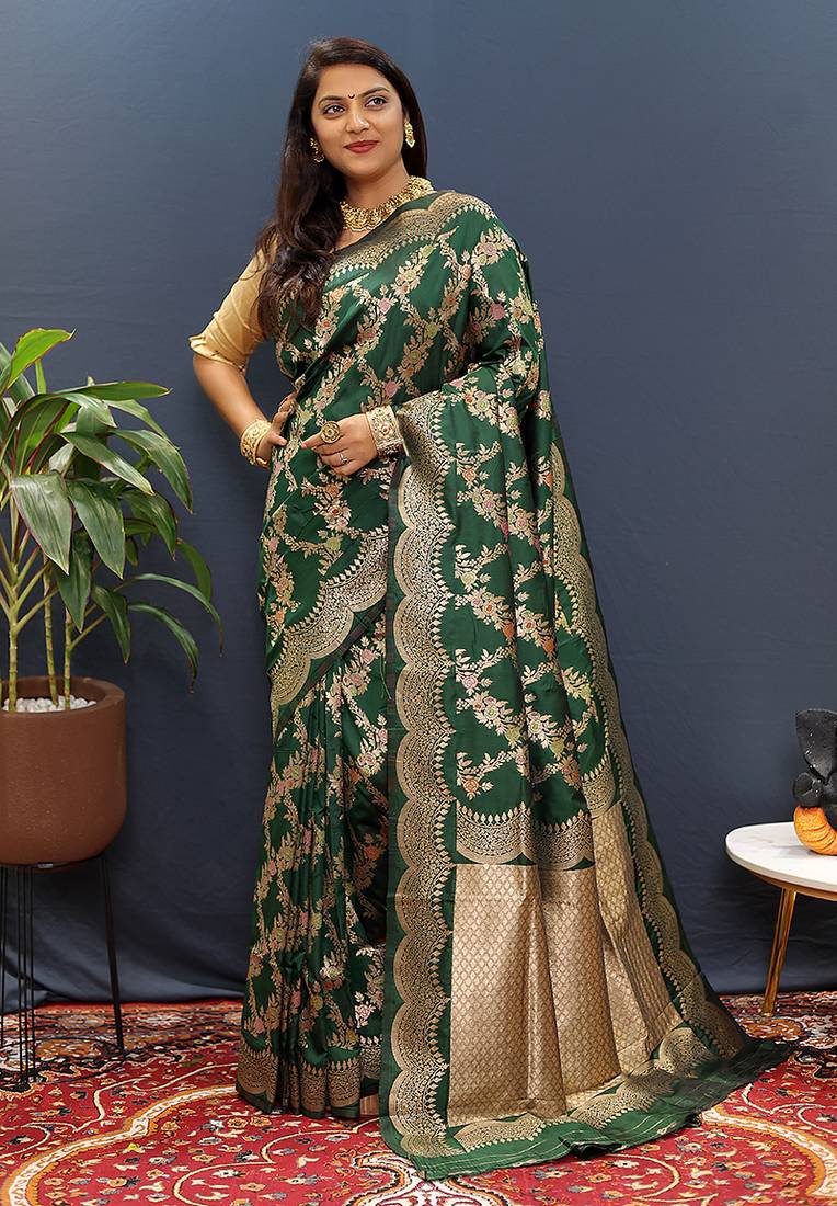 Dark green banarasi silk blend saree with gold zari floral weaving & rich pallu