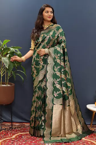 Dark green banarasi silk blend saree with gold zari floral weaving & rich pallu