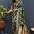 Dark green banarasi silk blend saree with gold zari floral weaving & rich pallu