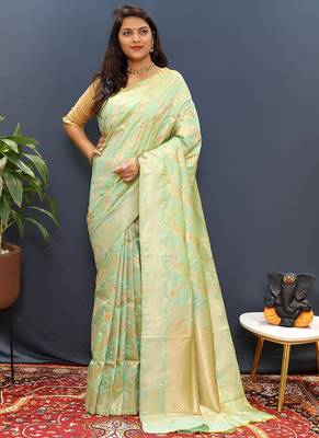 Mint green banarasi silk blend saree with gold zari floral weaving & rich pallu 1