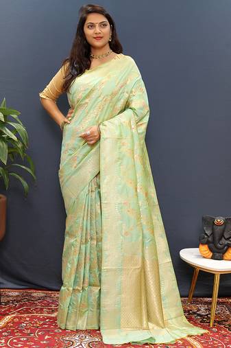 Mint green banarasi silk blend saree with gold zari floral weaving & rich pallu