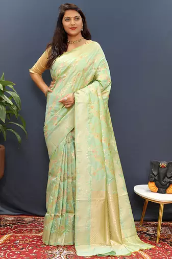 Mint green banarasi silk blend saree with gold zari floral weaving & rich pallu