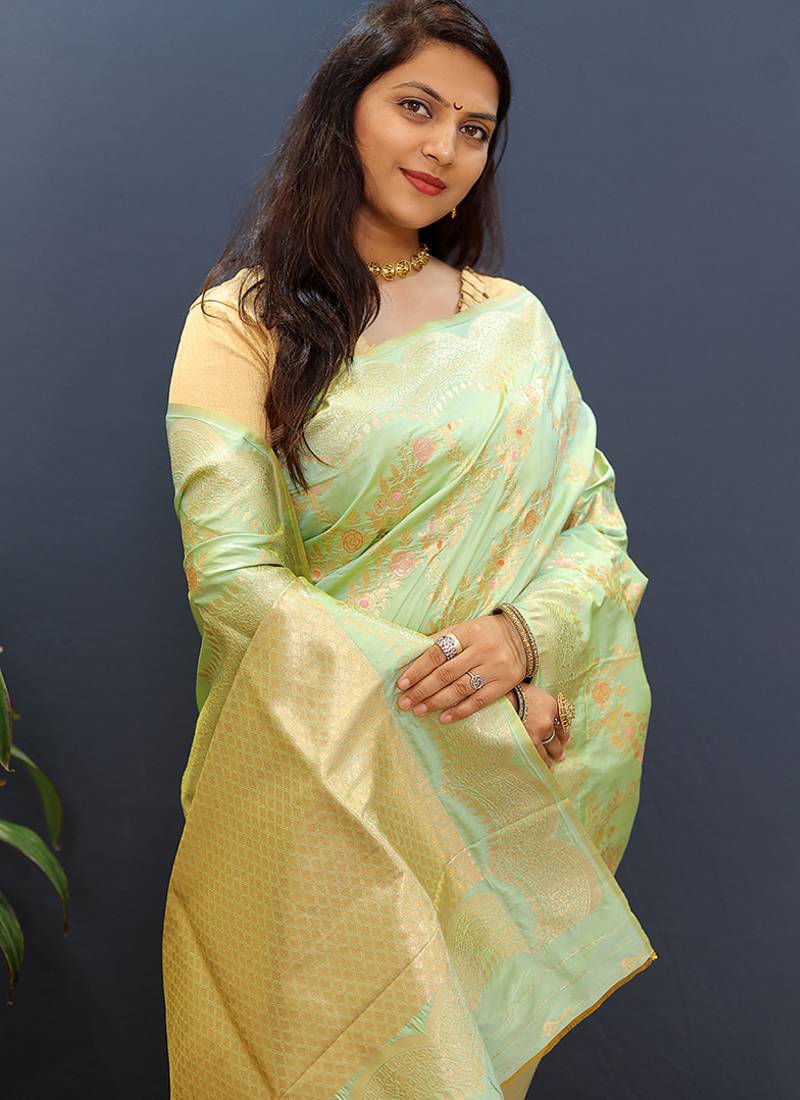 Mint green banarasi silk blend saree with gold zari floral weaving & rich pallu