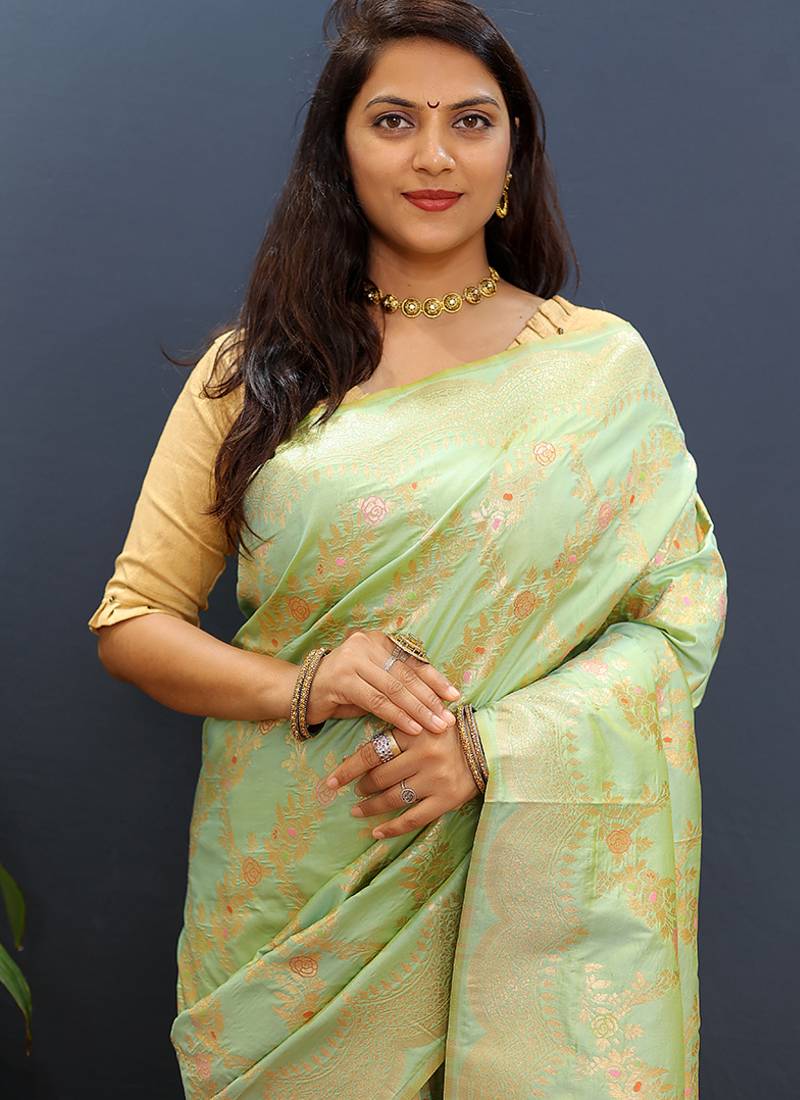 Mint green banarasi silk blend saree with gold zari floral weaving & rich pallu
