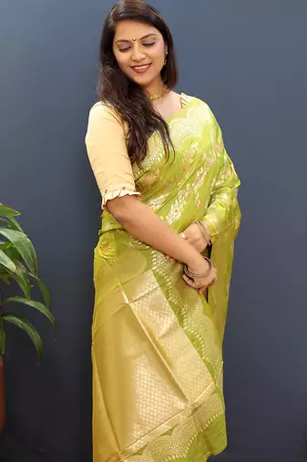 Mehendi green banarasi silk blend saree with gold zari floral weaving & rich pallu