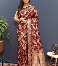 Maroon banarasi silk blend saree with gold zari floral weaving & rich pallu