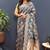 Grey banarasi silk blend saree with gold zari floral weaving & rich pallu