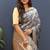 Grey banarasi silk blend saree with gold zari floral weaving & rich pallu