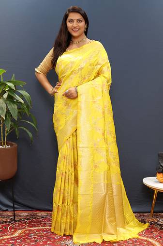 Yellow banarasi silk blend saree with gold zari floral weaving & rich pallu
