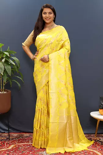 Yellow banarasi silk blend saree with gold zari floral weaving & rich pallu