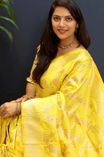 Yellow banarasi silk blend saree with gold zari floral weaving & rich pallu