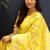 Yellow banarasi silk blend saree with gold zari floral weaving & rich pallu