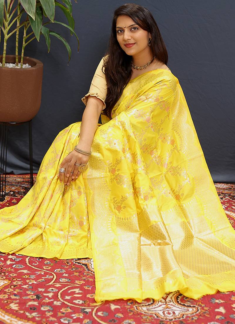 Yellow banarasi silk blend saree with gold zari floral weaving & rich pallu