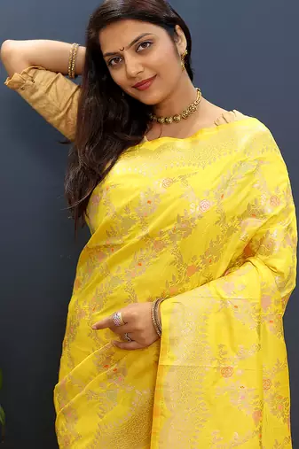 Yellow banarasi silk blend saree with gold zari floral weaving & rich pallu
