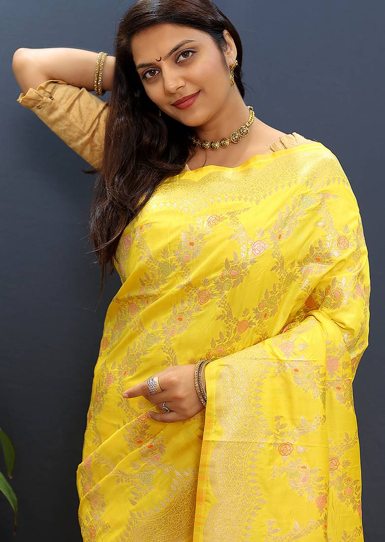 Yellow banarasi silk blend saree with gold zari floral weaving & rich pallu