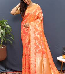 Peach banarasi silk blend saree with gold zari floral weaving & rich pallu