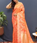Peach banarasi silk blend saree with gold zari floral weaving & rich pallu