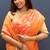 Peach banarasi silk blend saree with gold zari floral weaving & rich pallu