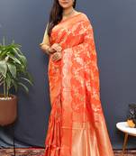 Orange banarasi silk blend saree with gold zari floral weaving & rich pallu