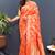 Orange banarasi silk blend saree with gold zari floral weaving & rich pallu