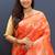 Orange banarasi silk blend saree with gold zari floral weaving & rich pallu