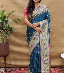 Teal blue paithani silk blend saree with peacock floral border & rani pink blouse