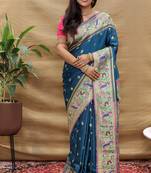 Teal blue paithani silk blend saree with peacock floral border & rani pink blouse
