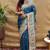 Teal blue paithani silk blend saree with peacock floral border & rani pink blouse