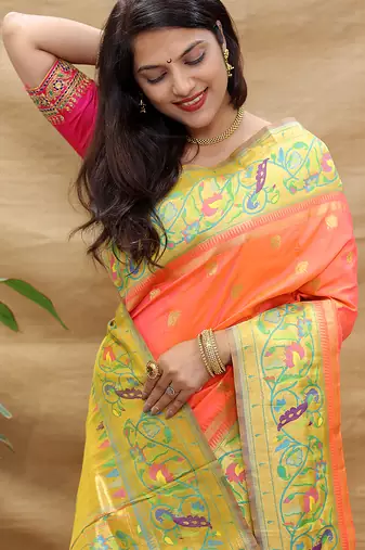 Peach paithani silk blend saree with peacock floral border & rani pink blouse